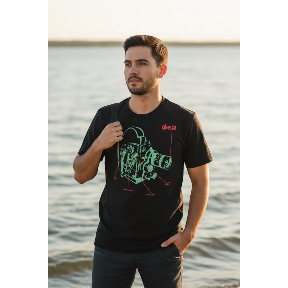 Glas Apparel 16MM black cotton t-shirt featuring a green vintage film camera graphic print on the chest